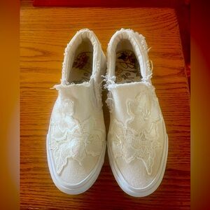 White loafers made by Blowfish